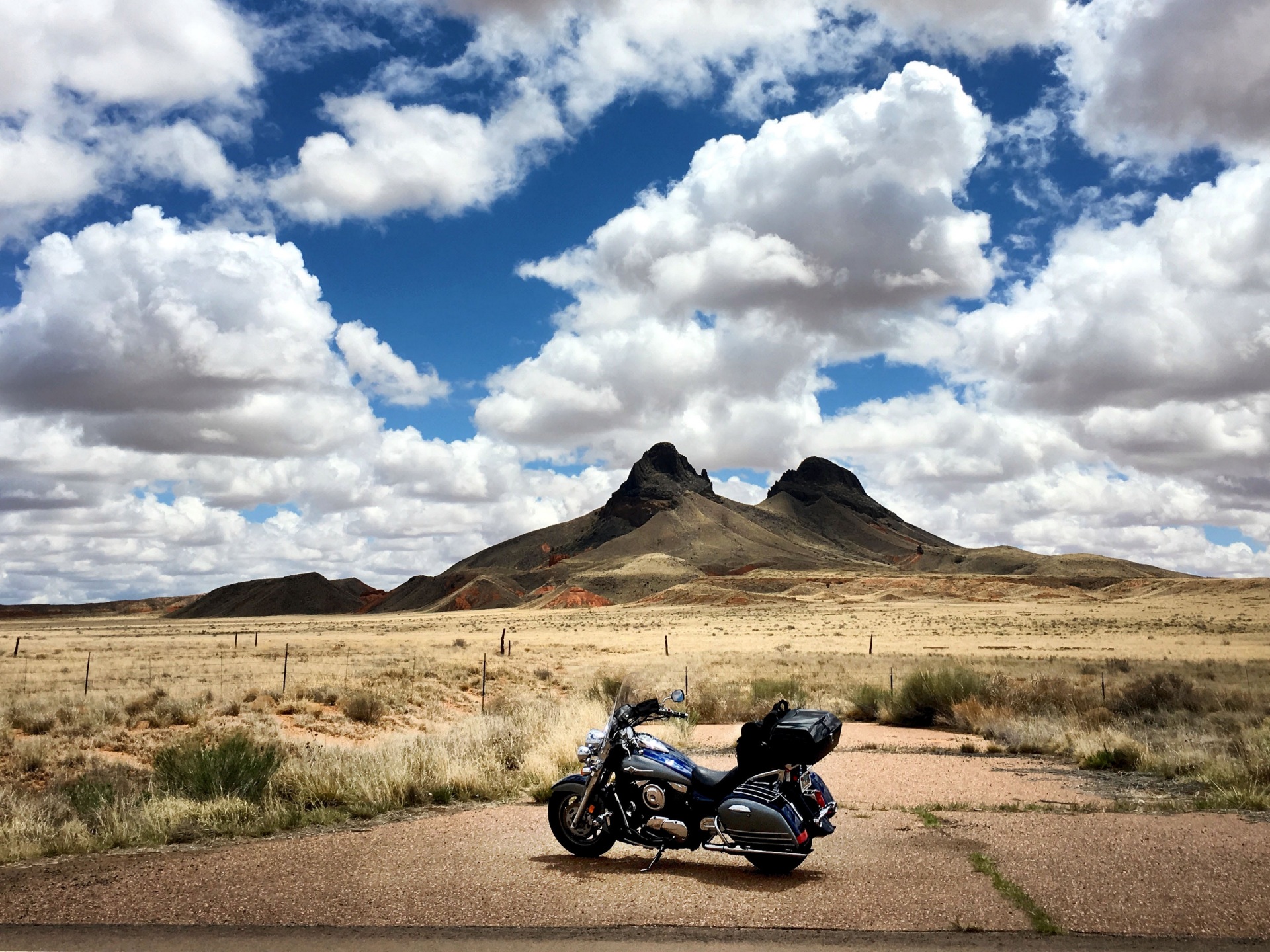 Wallpaper 4k motorcycle, mountains, desert, clouds, travel 4k Wallpaper