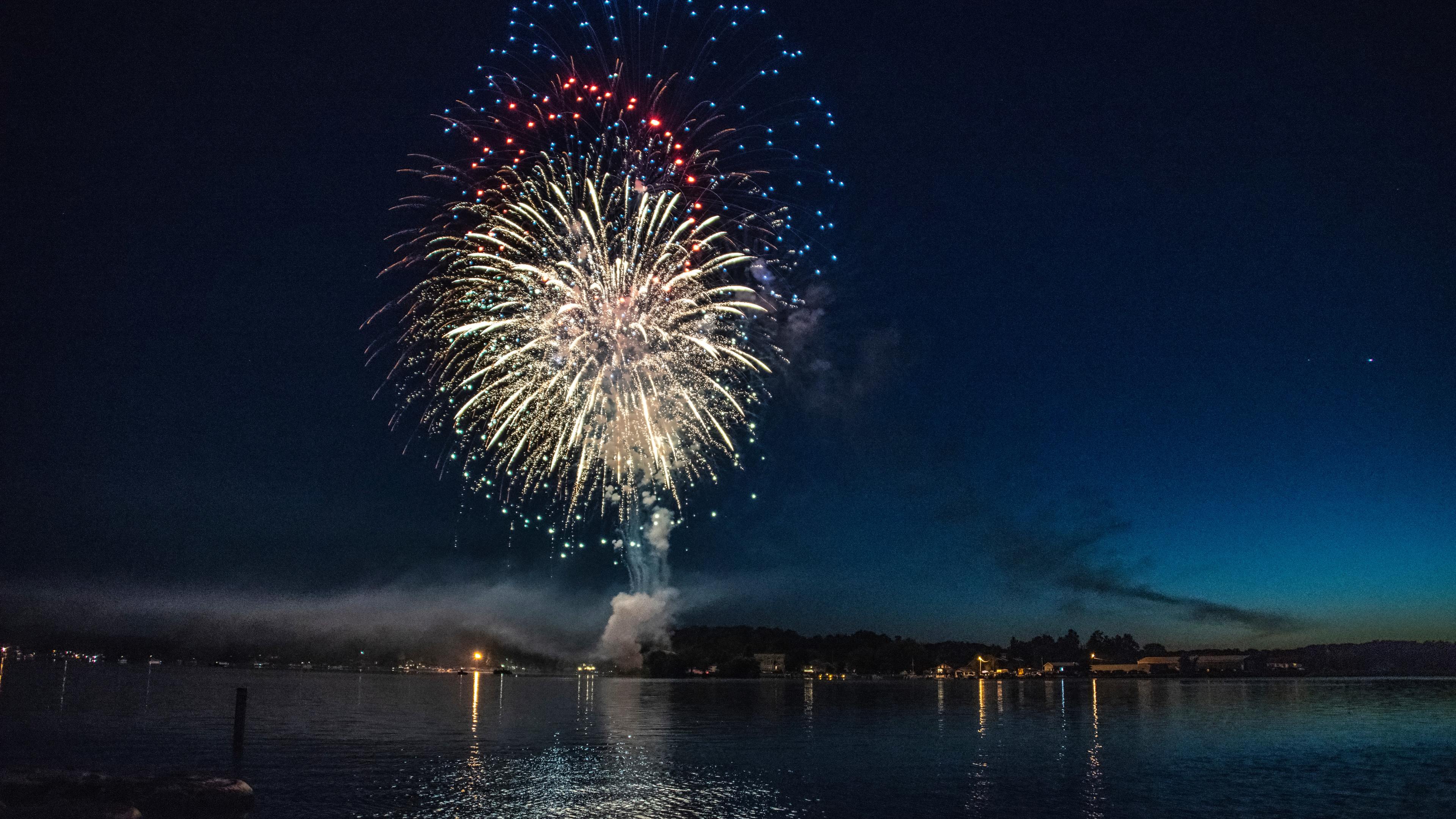 fireworks explosion above water body 4k 1540143366 - Fireworks Explosion Above Water Body 4k - photography wallpapers, hd-wallpapers, fireworks wallpapers, 8k wallpapers, 5k wallpapers, 4k-wallpapers
