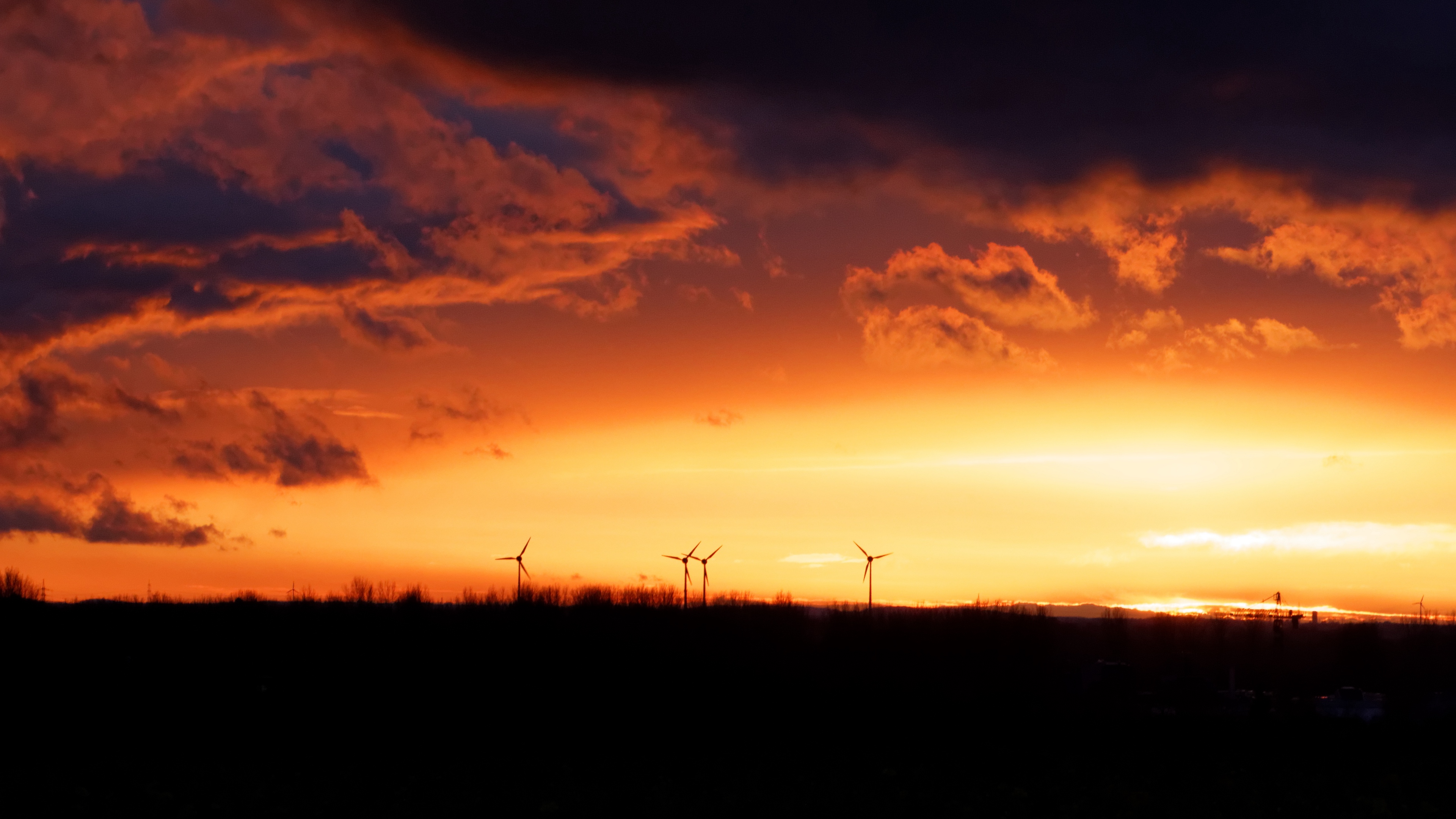 wind turbines sunset horizon clouds 4k 1541117107 - wind turbines, sunset, horizon, clouds 4k - wind turbines, sunset, Horizon