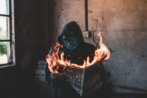 hidden mask guy burning newspaper 1574938425 300x200 - Hidden Mask Guy Burning Newspaper -