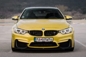 bmw car front view yellow 4k 1691771365