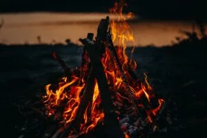 bonfire fire flame dark dusk 4k 1691839438