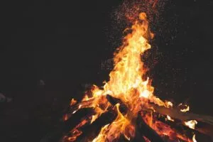 bonfire fire sparks night dark 4k 1692006754