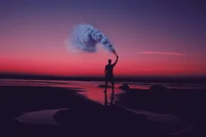 man silhouette smoke shore sunset sea asilah morocco 4k 1691839436