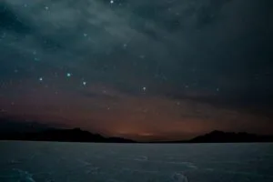 night starry sky mountains dark landscape 4k 1692006754