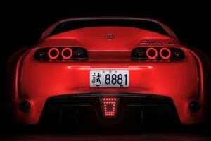 toyota supra toyota sportscar red rear view dark backlight 4k 1691828627