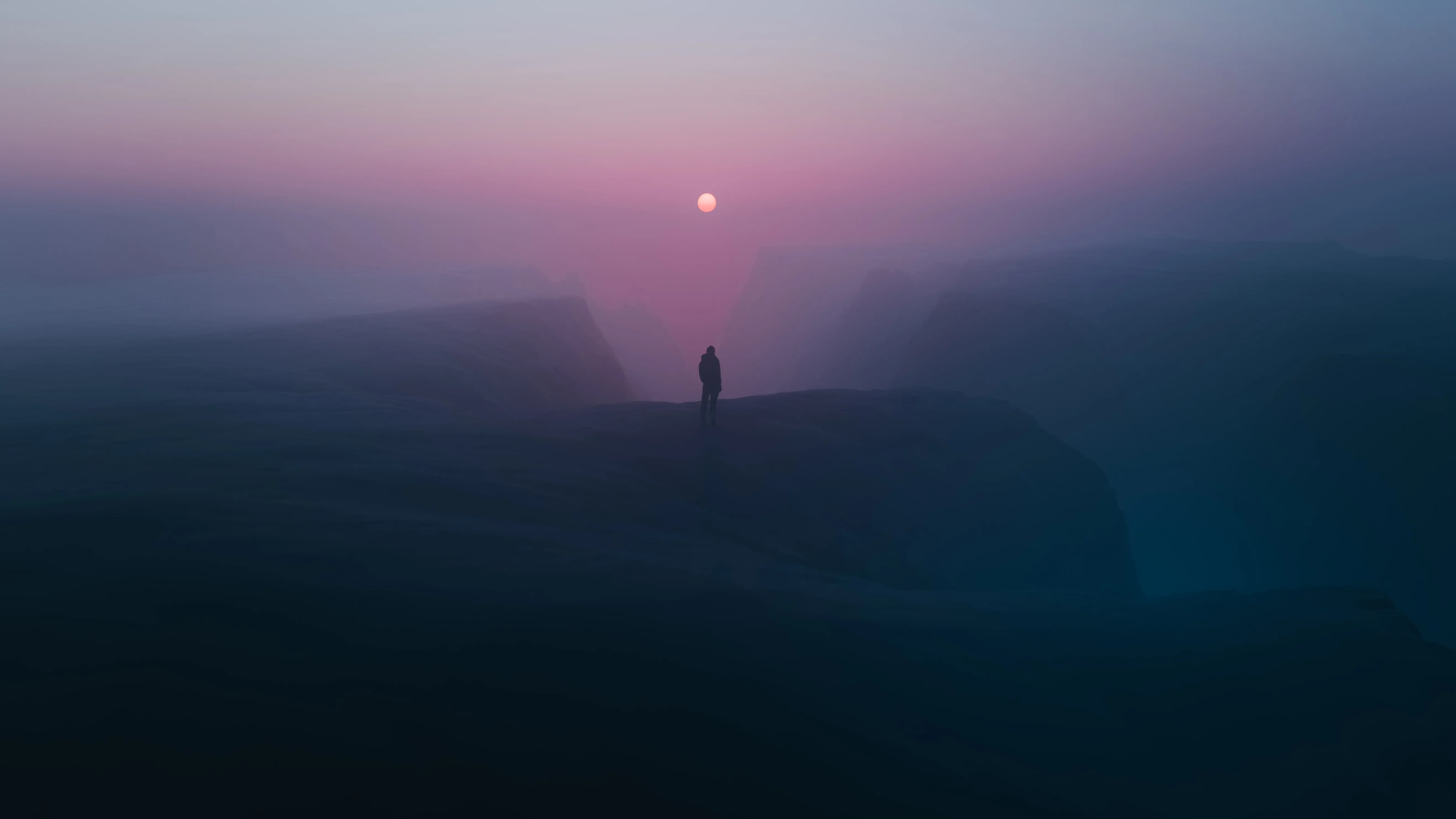 foggy horizons person standing at a top of mountains b4.jpg